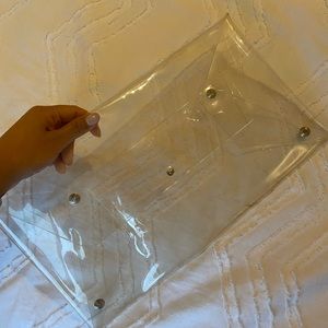 Clear oversized PVC clutch